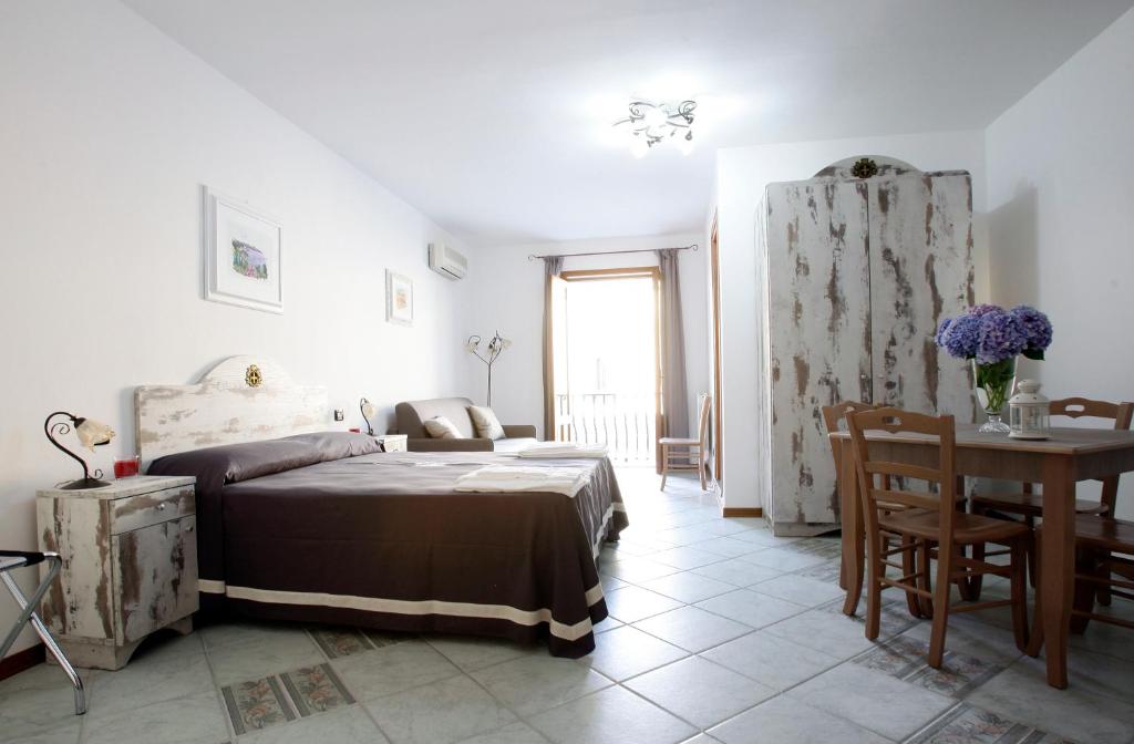 Postel nebo postele na pokoji v ubytování Luxury Room Vittorio Emanuele II