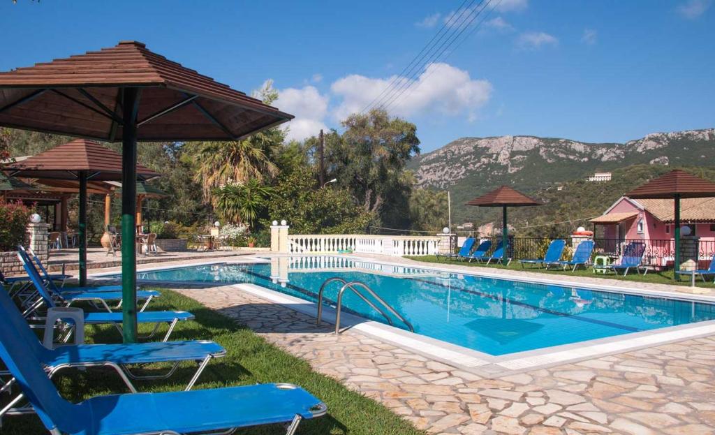 The swimming pool at or close to Villa Papoulas