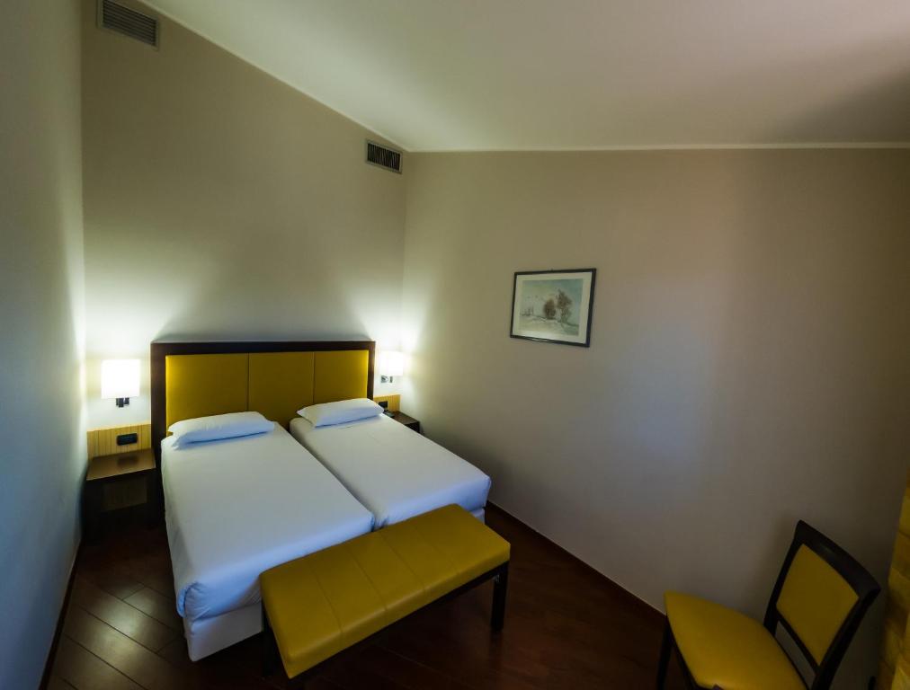 Postel nebo postele na pokoji v ubytování Hotel Sirio - Sure Hotel Collection by Best Western