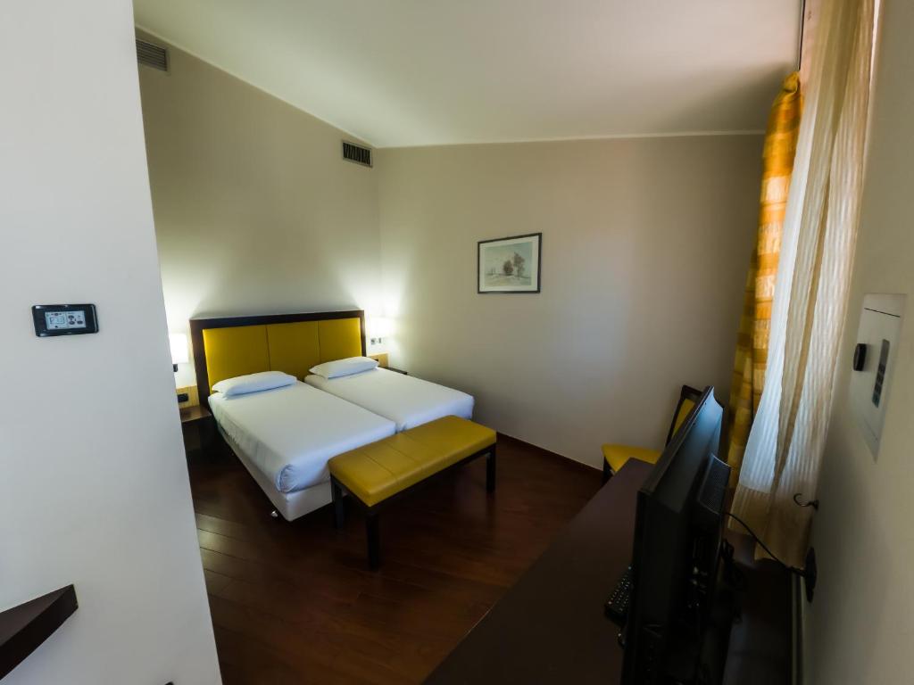 Postel nebo postele na pokoji v ubytování Hotel Sirio - Sure Hotel Collection by Best Western