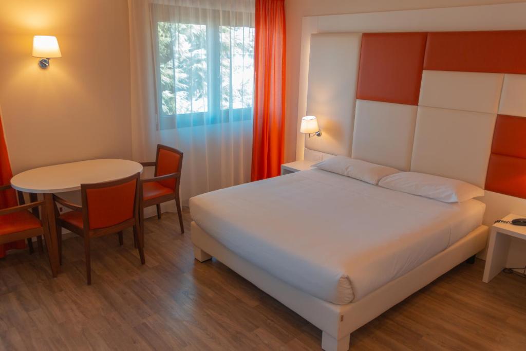 Postel nebo postele na pokoji v ubytování Hotel Sirio - Sure Hotel Collection by Best Western