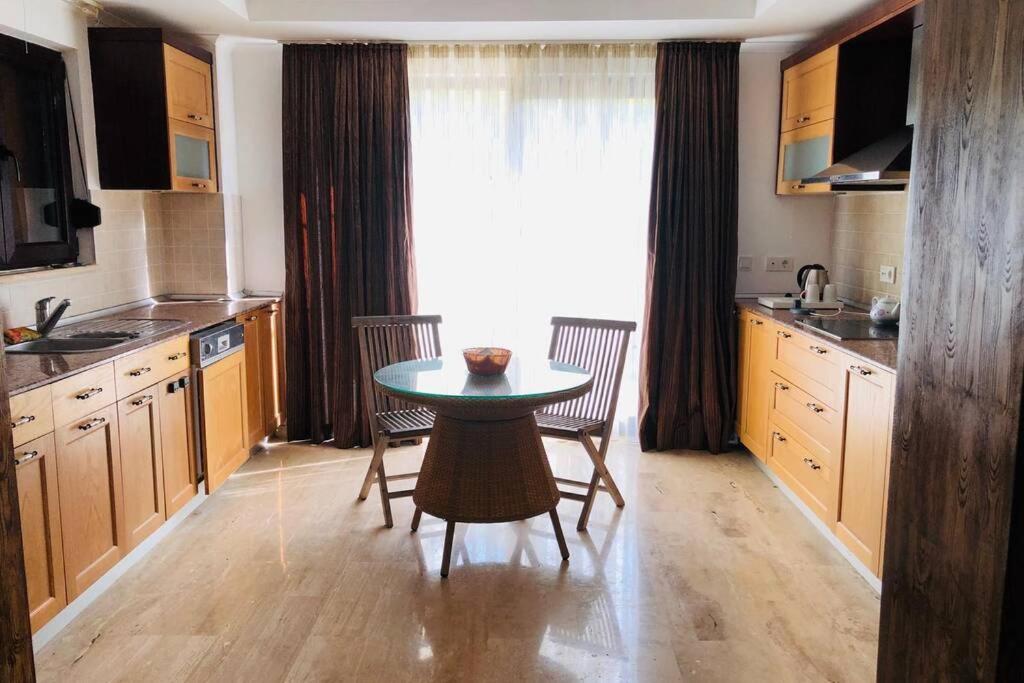A kitchen or kitchenette at Fun&Sun Luxury River Villa With Amazing Landscape
