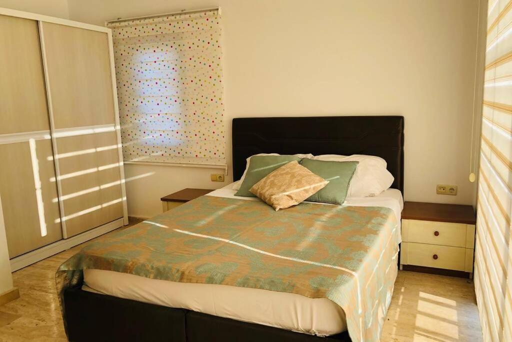 A bed or beds in a room at Fun&Sun Luxury River Villa With Amazing Landscape