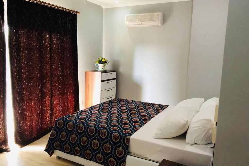 A bed or beds in a room at Fun&Sun Luxury River Villa With Amazing Landscape