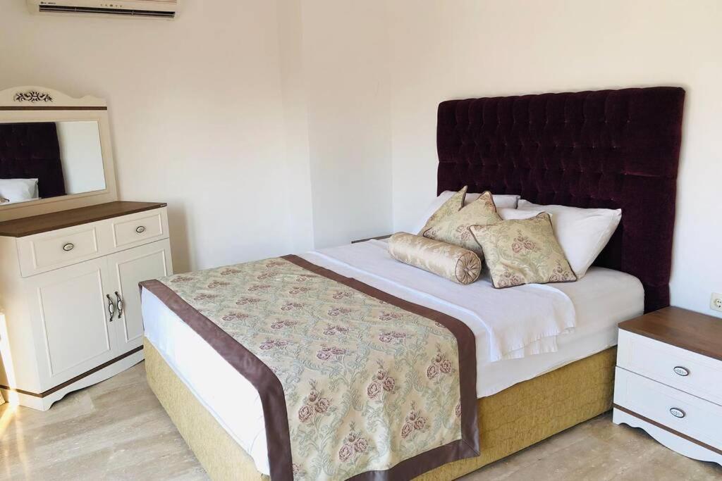 A bed or beds in a room at Fun&Sun Luxury River Villa With Amazing Landscape