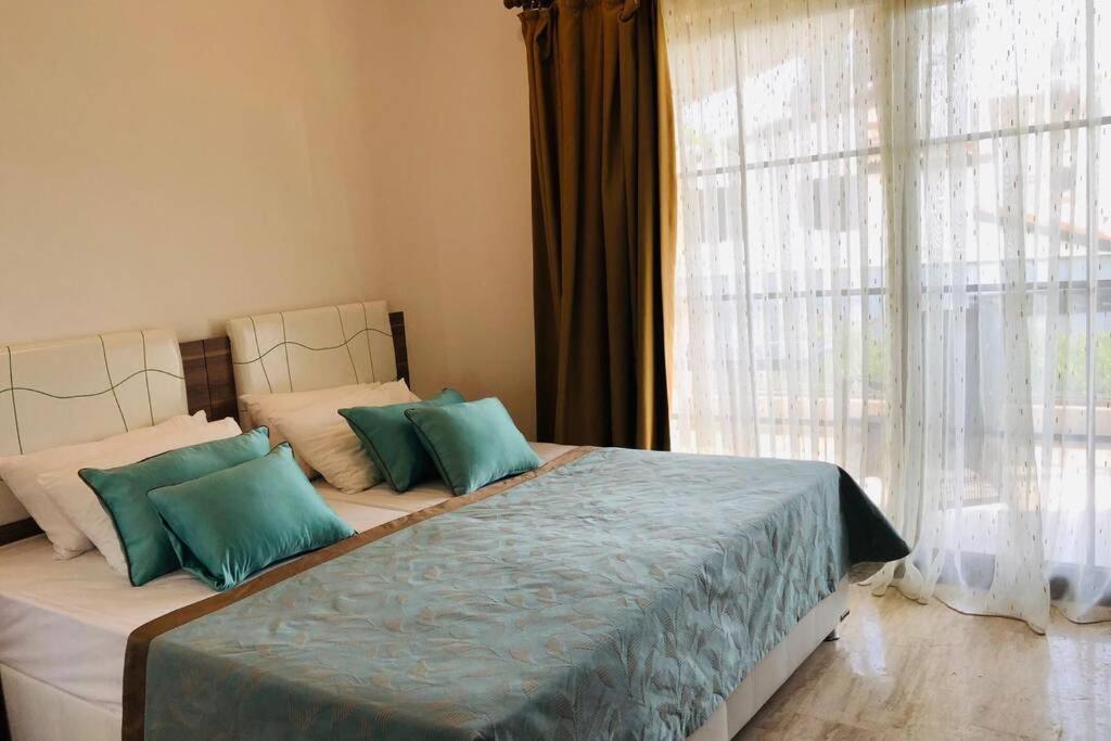 A bed or beds in a room at Fun&Sun Luxury River Villa With Amazing Landscape