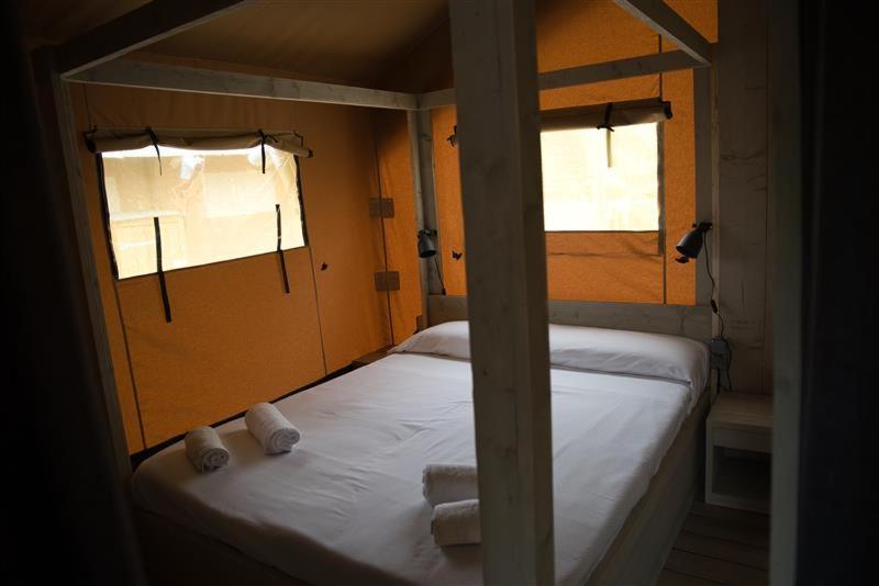Postel nebo postele na pokoji v ubytování Camping La Ribera Salada