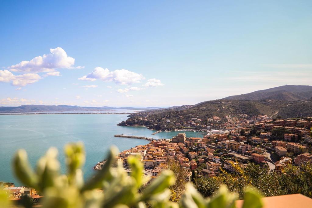 a view of a city and a body of water at Residence Sole Dell'Argentario in Porto Santo Stefano