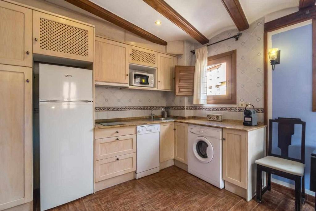 Kuchyň nebo kuchyňský kout v ubytování Hotel Apartamentos Melihah