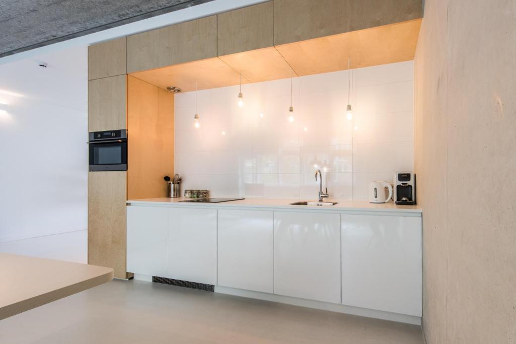 Kuchyň nebo kuchyňský kout v ubytování Houthavens Apartments