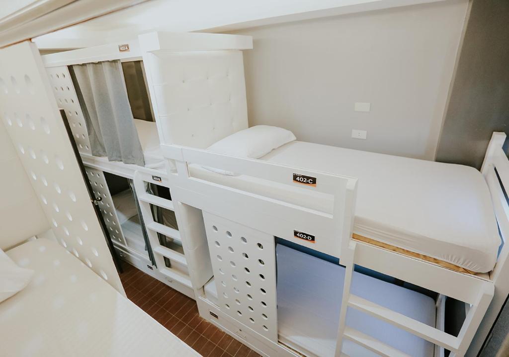 Kuchyň nebo kuchyňský kout v ubytování Viajeros Hostel Boracay