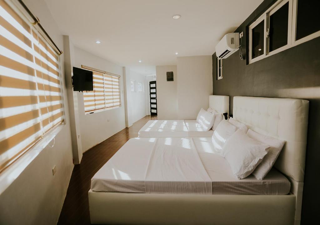 Postel nebo postele na pokoji v ubytování Viajeros Hostel Boracay