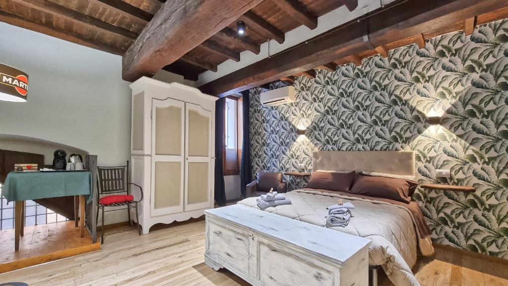 Postel nebo postele na pokoji v ubytování Residenza dei Longobardi Affittacamere