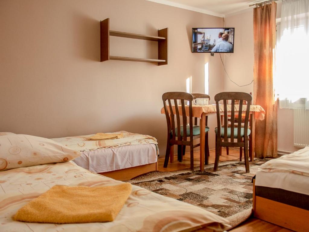 Postel nebo postele na pokoji v ubytování Zajazd Zacisze
