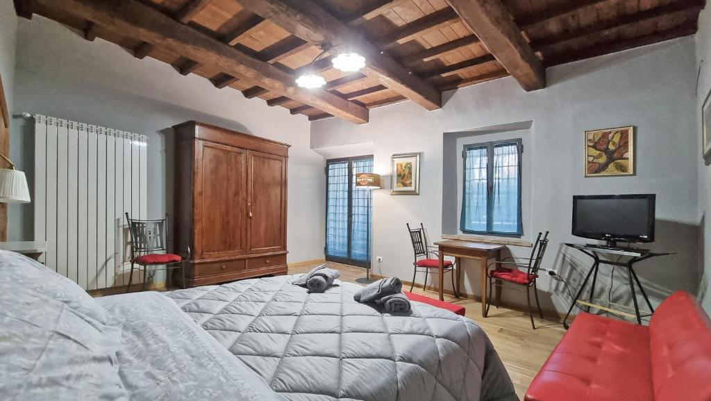 TV a/nebo společenská místnost v ubytování Residenza dei Longobardi Affittacamere