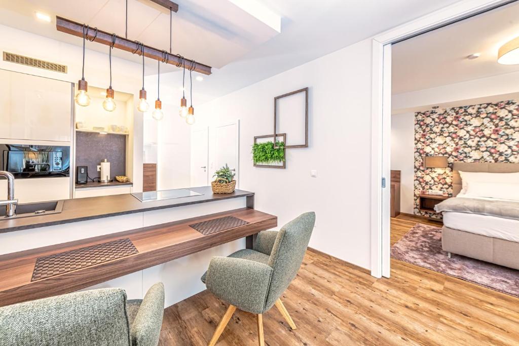 Postel nebo postele na pokoji v ubytování VIVA Apartments