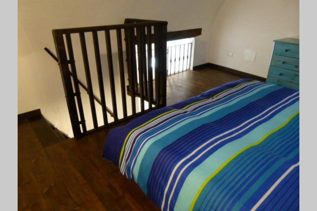 Postel nebo postele na pokoji v ubytování Casa Cabiria