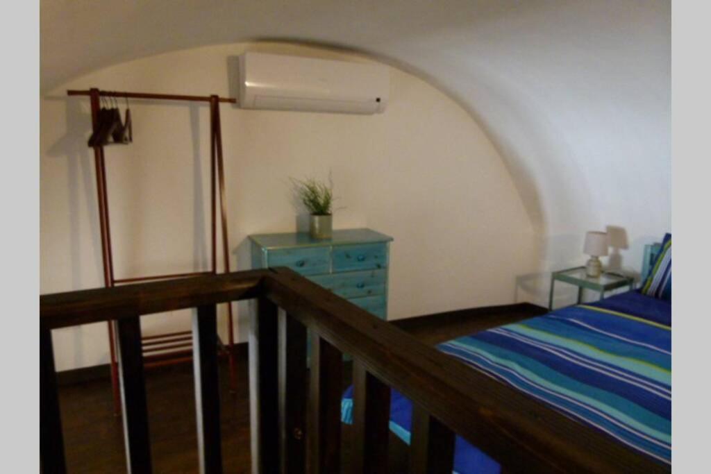 Postel nebo postele na pokoji v ubytování Casa Cabiria