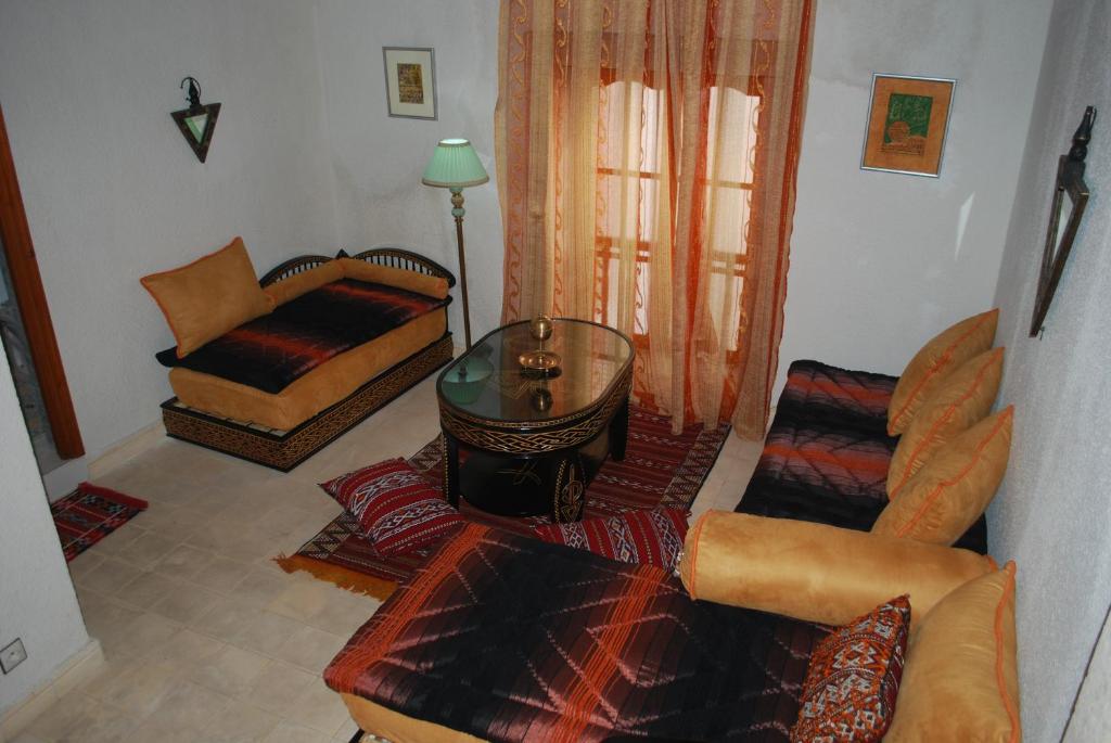Postel nebo postele na pokoji v ubytování Riad Arambys