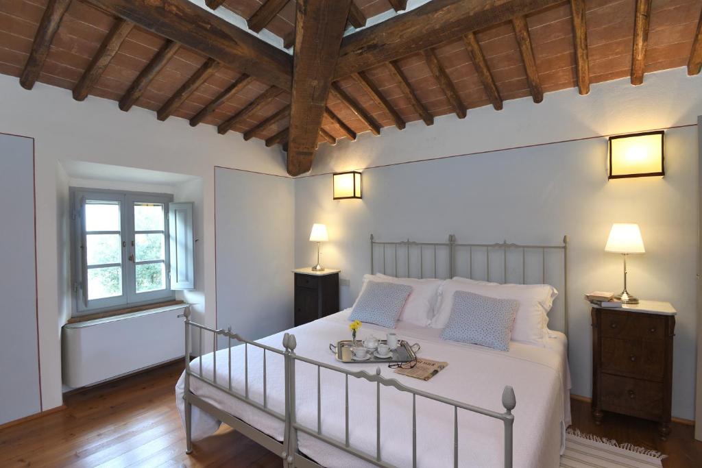Posteľ alebo postele v izbe v ubytovaní RICASOLI, Villa Agresto