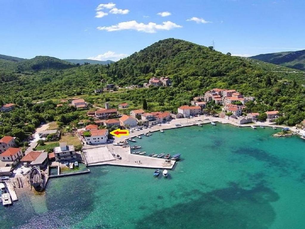 an aerial view of a small island in the water at Holiday Home By The Sea - Nina & Kate in Ston