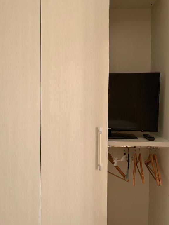 Telewizja i/lub zestaw kina domowego w obiekcie Sweet Emma