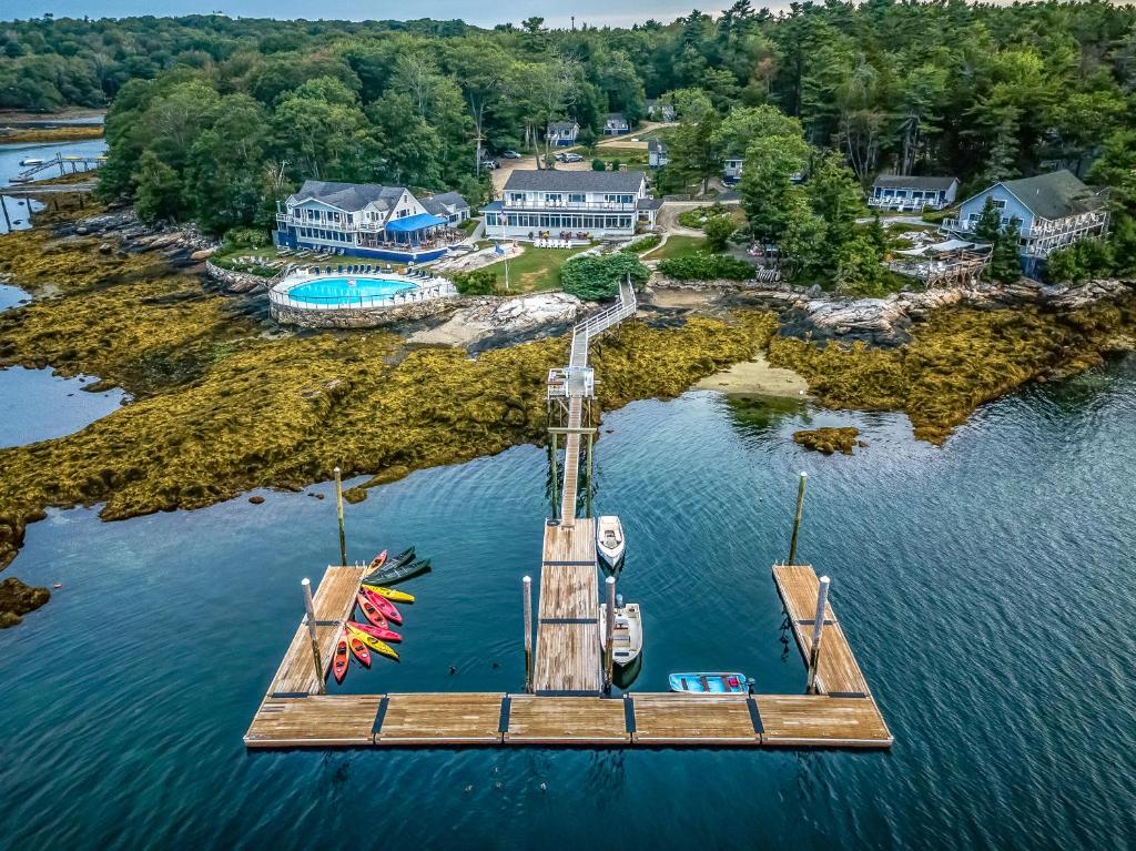 an aerial view of a dock with boats in the water at Linekin Bay Resort in Boothbay Harbor