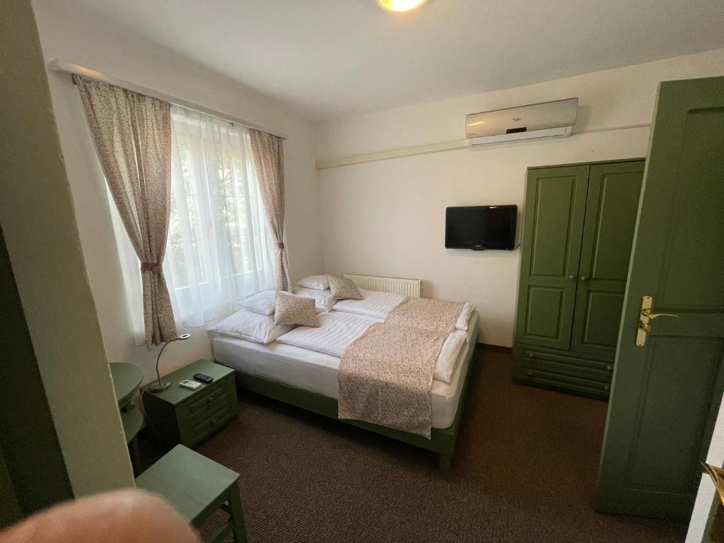 Posteľ alebo postele v izbe v ubytovaní Villa Astoria