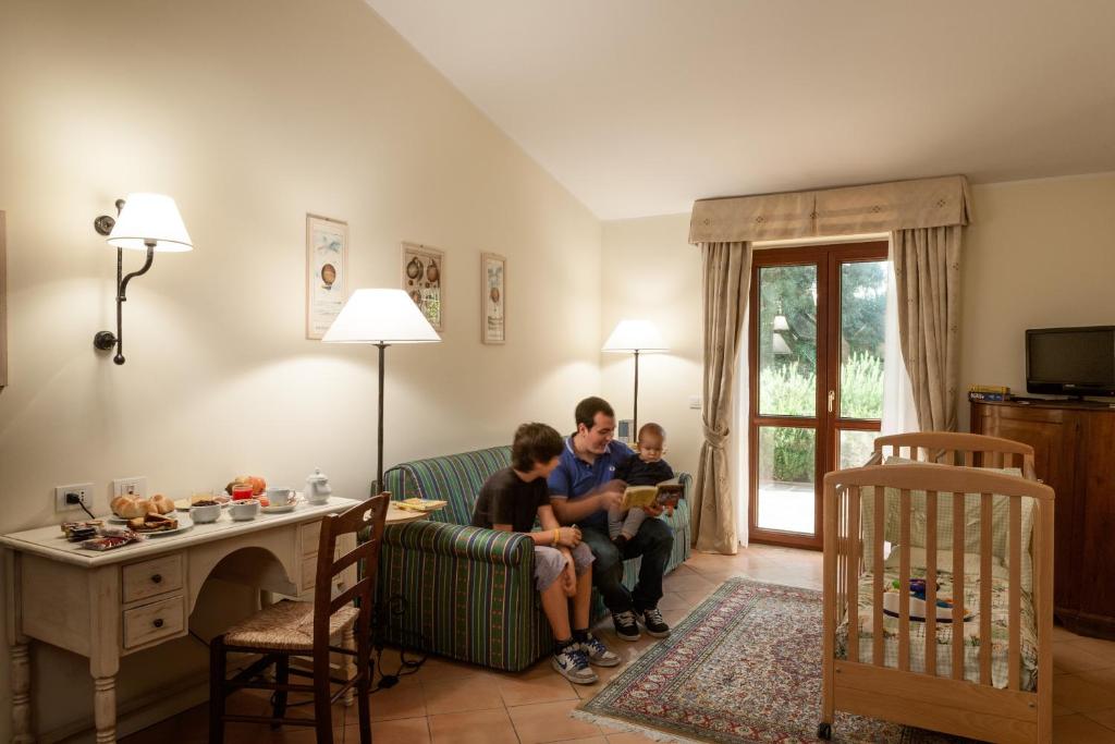 TV a/nebo společenská místnost v ubytování Hotel Selva Candida