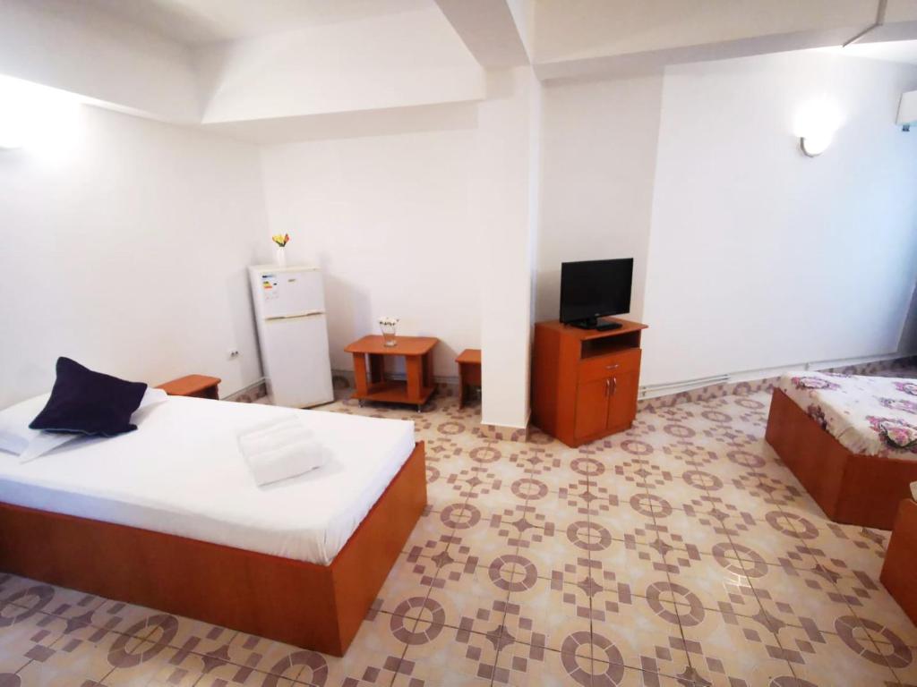 Postel nebo postele na pokoji v ubytování Berlin - Locatie Centrala