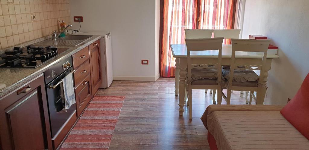 Kuchyň nebo kuchyňský kout v ubytování Romeo & Juliet Non-Hotel