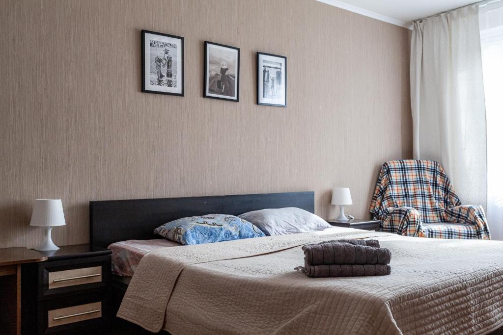 Кровать или кровати в номере Standard Brusnika standart Yaseneva
