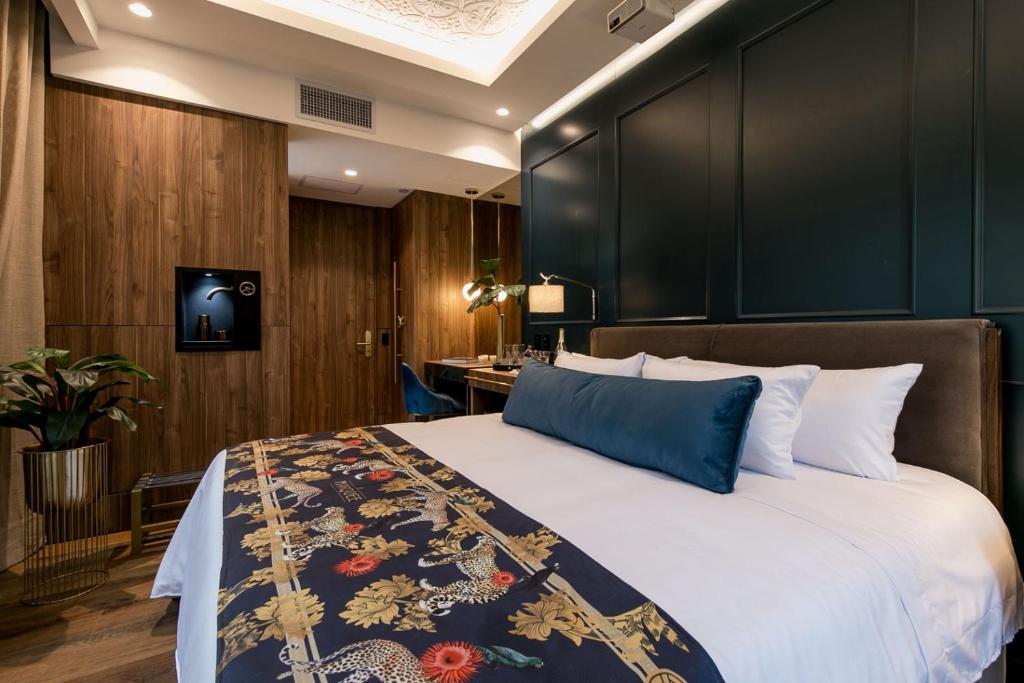 Postel nebo postele na pokoji v ubytování Hotel Marquee Medellín