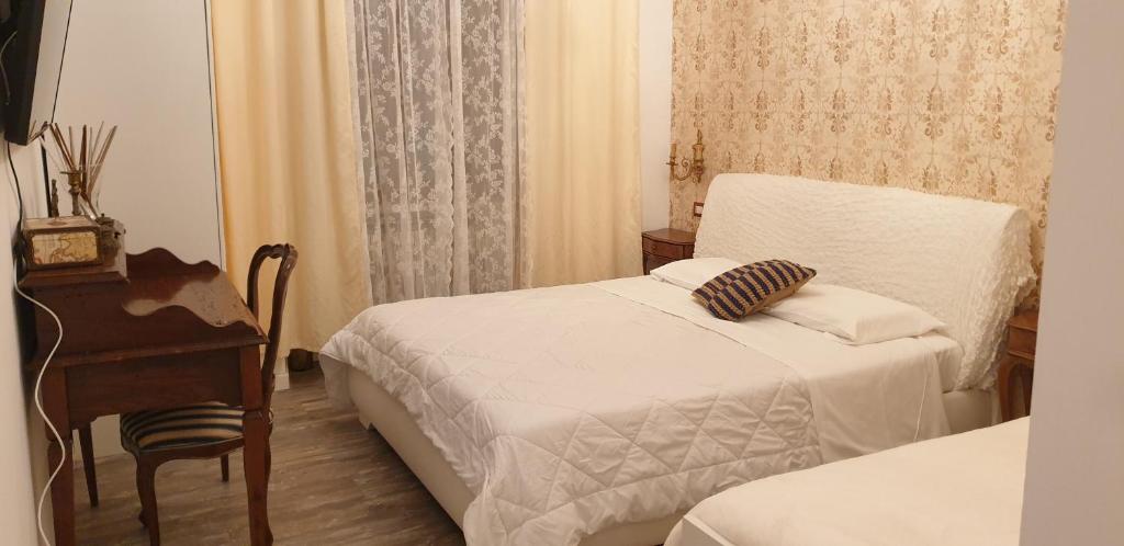 Postel nebo postele na pokoji v ubytování Romeo & Juliet Non-Hotel