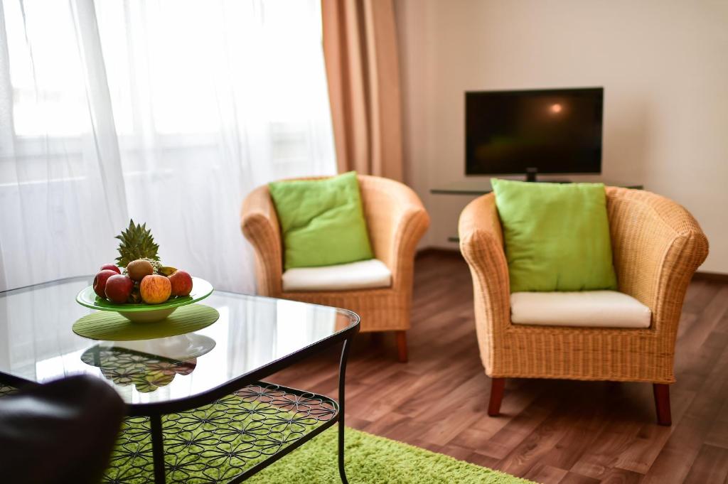 TV a/nebo společenská místnost v ubytování STADT HOTEL Iserlohn