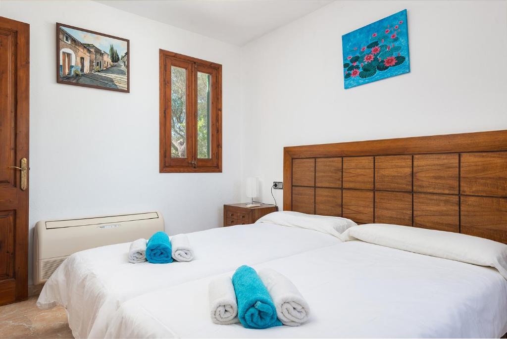 Postel nebo postele na pokoji v ubytování Son Rotger, villa Tía Catalina con piscina en Alcudia
