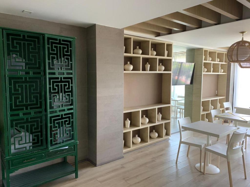 Posezení v ubytování Motel Okura Villas y Suites