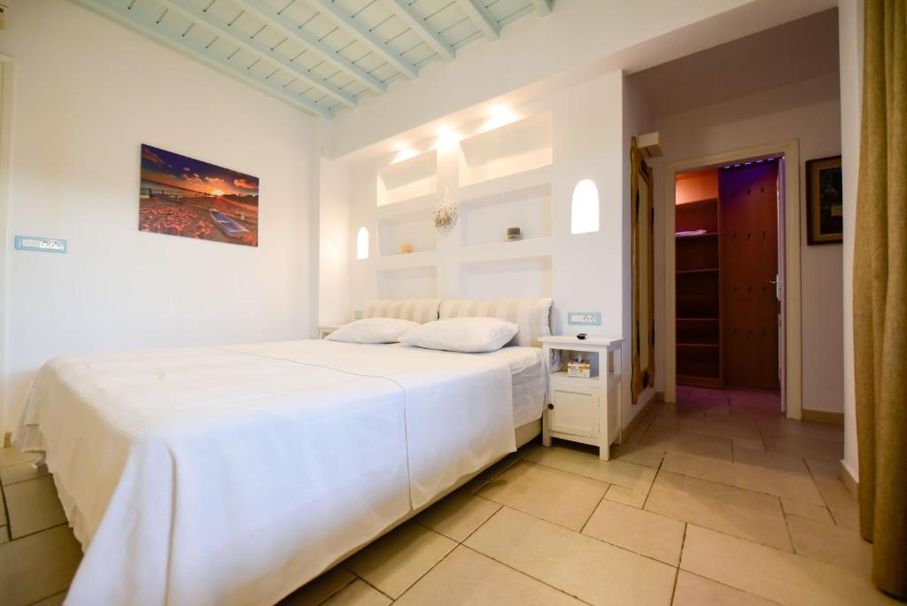 Łóżko lub łóżka w pokoju w obiekcie Villa Irina Mykonos