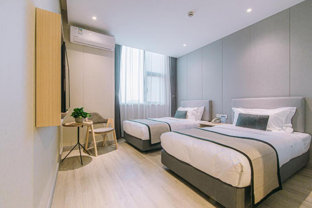 Shanghai JOYFUL YARD Hotel-Free shuttle bus from Pudong Airport and Disneylan - Standard Zweibettzimmer