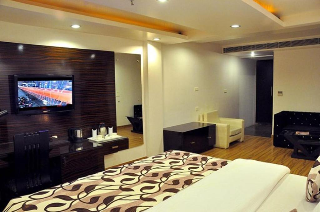 Postel nebo postele na pokoji v ubytování Hotel Elegance