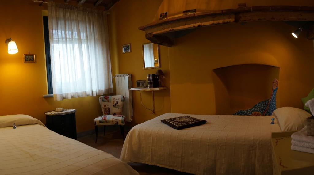 Postel nebo postele na pokoji v ubytování Il Cantuccio