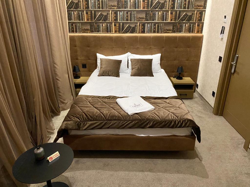 Postel nebo postele na pokoji v ubytování Kuprin Hotel