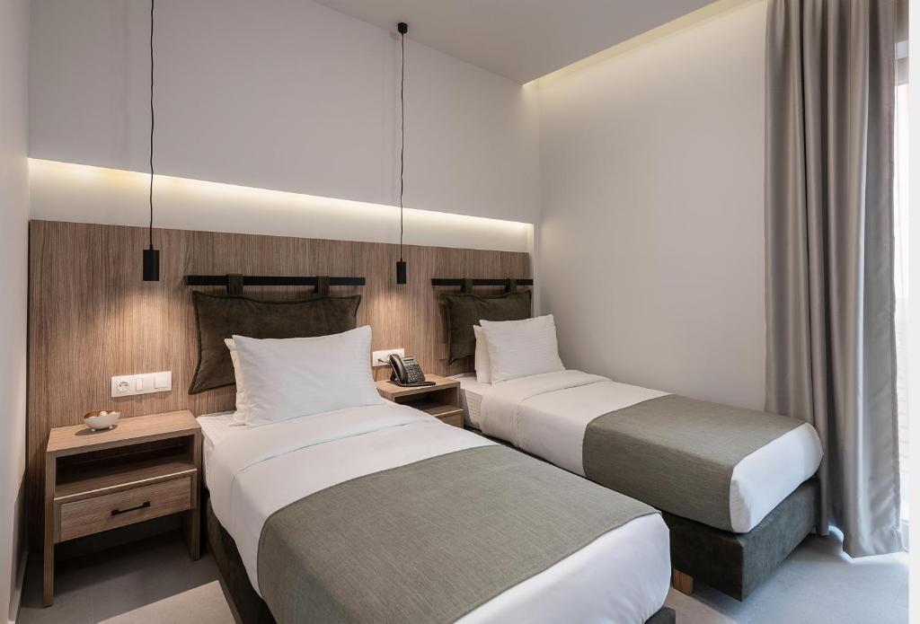 Postel nebo postele na pokoji v ubytování Morum City Hotel Chania