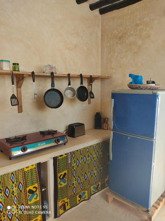 Kuchyň nebo kuchyňský kout v ubytování Furaha House