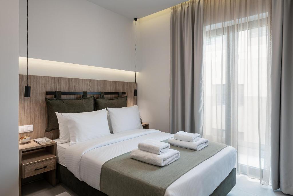 Postel nebo postele na pokoji v ubytování Morum City Hotel Chania