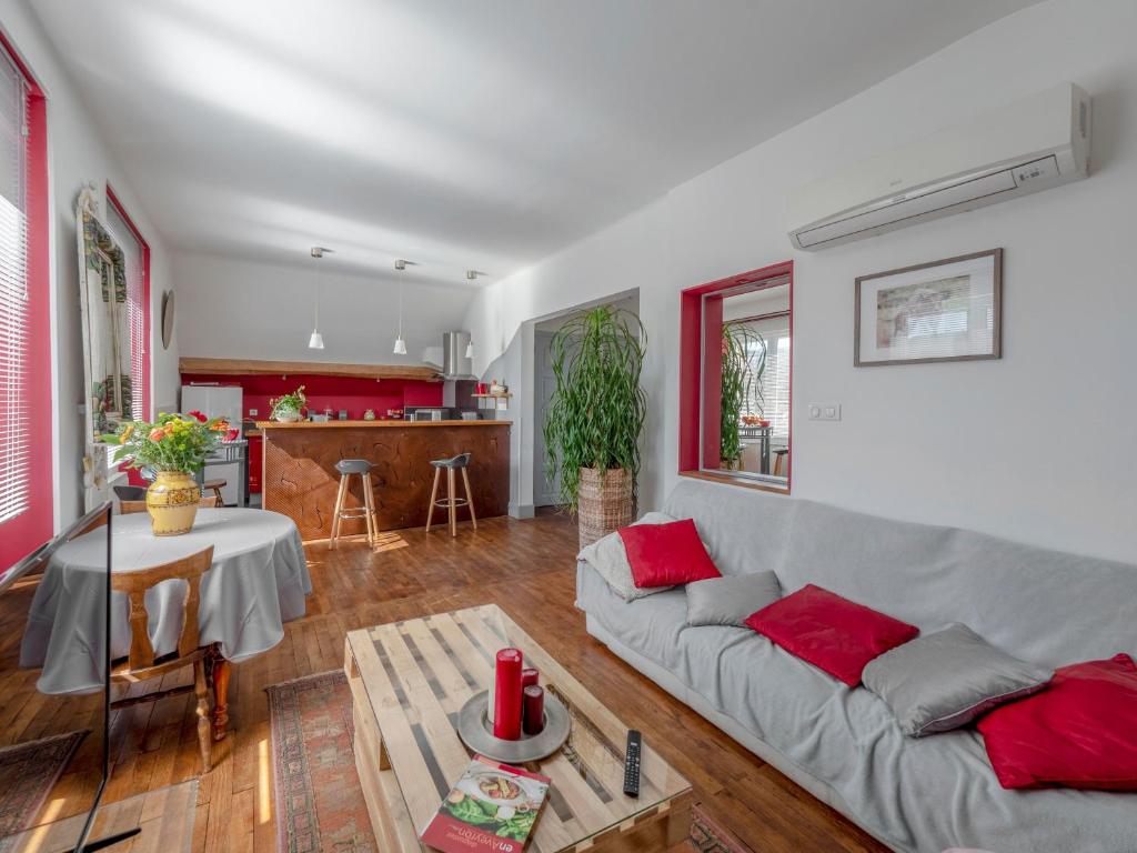 a living room with a couch and a table at Engie in Gaillac-dʼAveyron