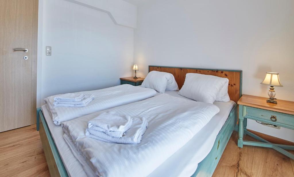 Postel nebo postele na pokoji v ubytování TownHouse Appartements