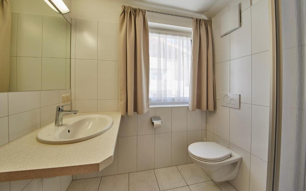 Koupelna v ubytování TownHouse Appartements