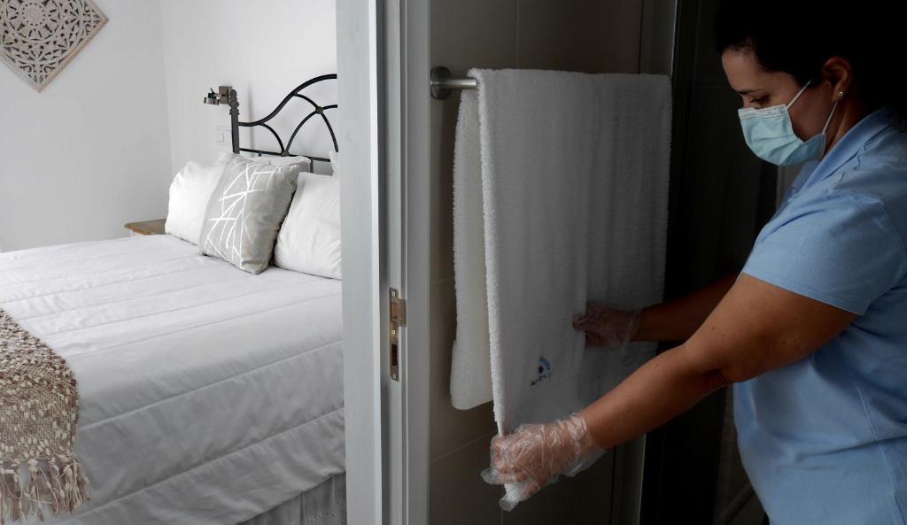Postel nebo postele na pokoji v ubytování Garoupas Inn