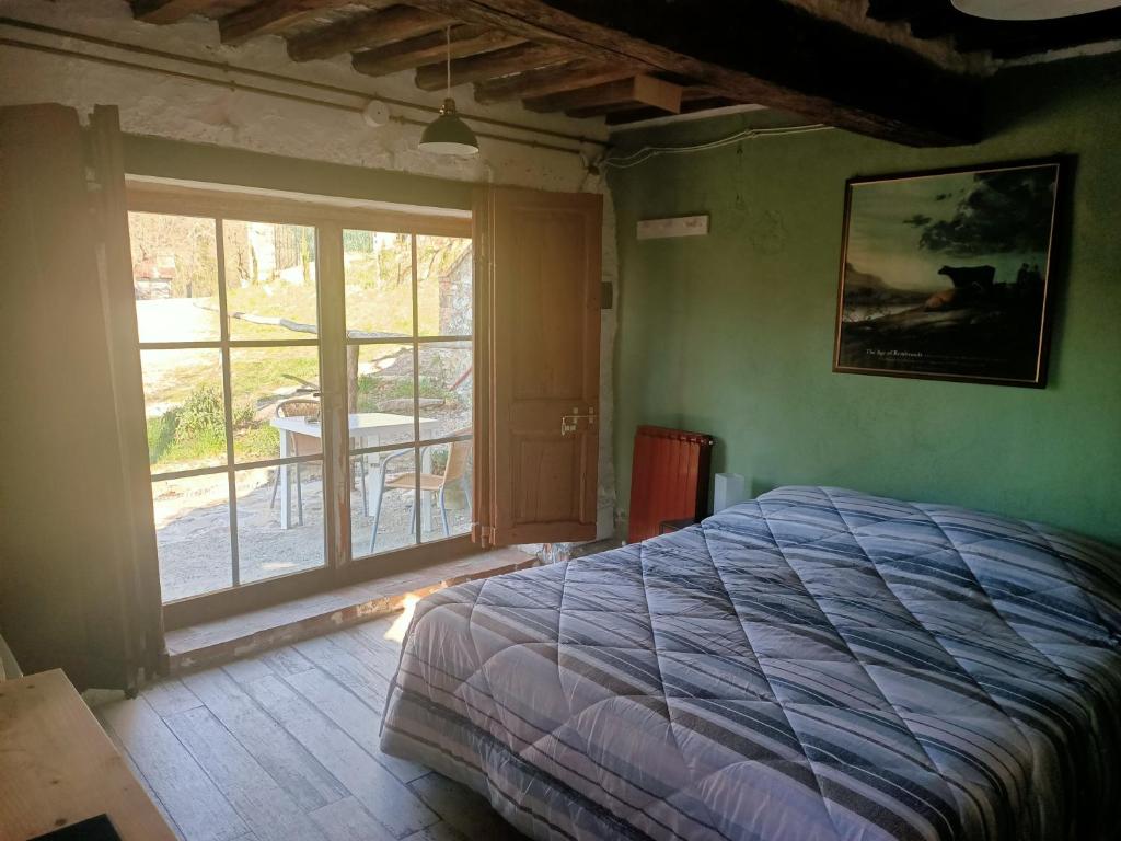 Postel nebo postele na pokoji v ubytování Casa Nati